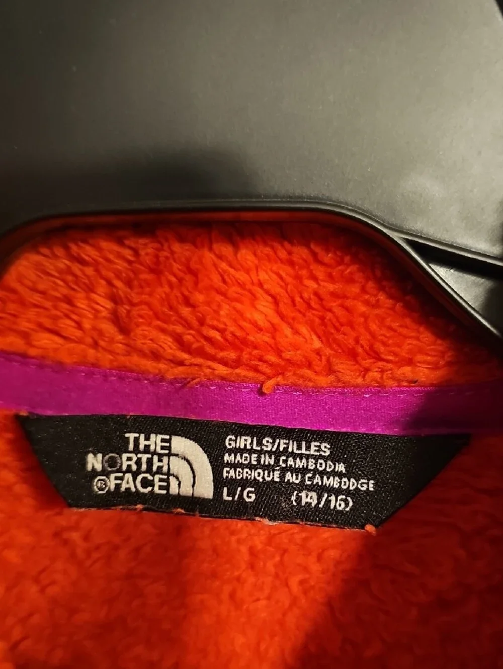 The North Face Girl's Bright Orange Plush Full-Zip Jacket with Purple Accents